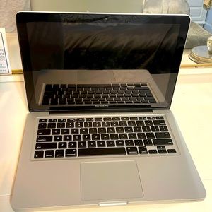 Mid 2012 MacBook Pro. 13 inch. 4 GB